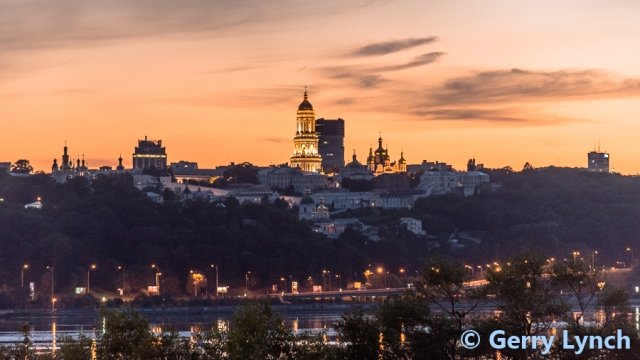 The Kyiv Pechersk Lavra monastery complex shot from the Paton Bridge in a golden evening twilight, 9 August 2018